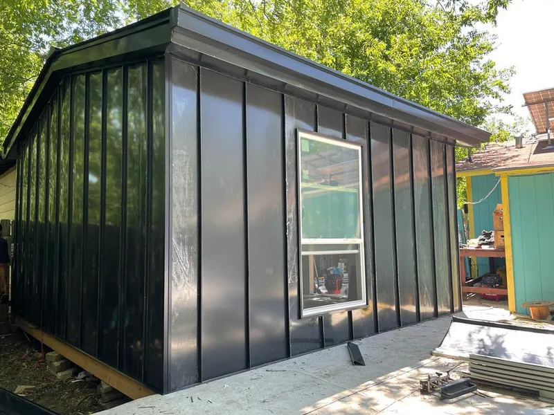 Black standing seam metal wall panels for Roof Inspection in Arden Hills