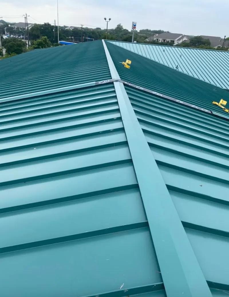 Green commercial metal roof ridge and valley for Metal Roof Repair in Arden Hills