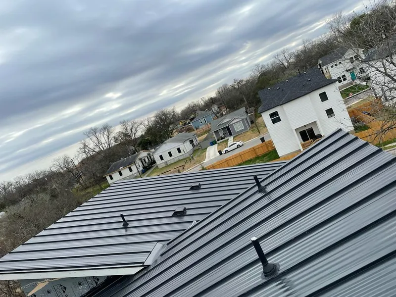 Standing seam metal roof panels with vents for Skylight Repair in Arden Hills